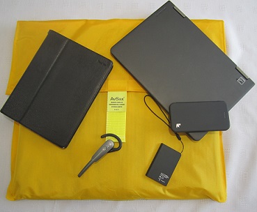 An AvSax fire containment bag and some of the personal electronic devices that  go in it